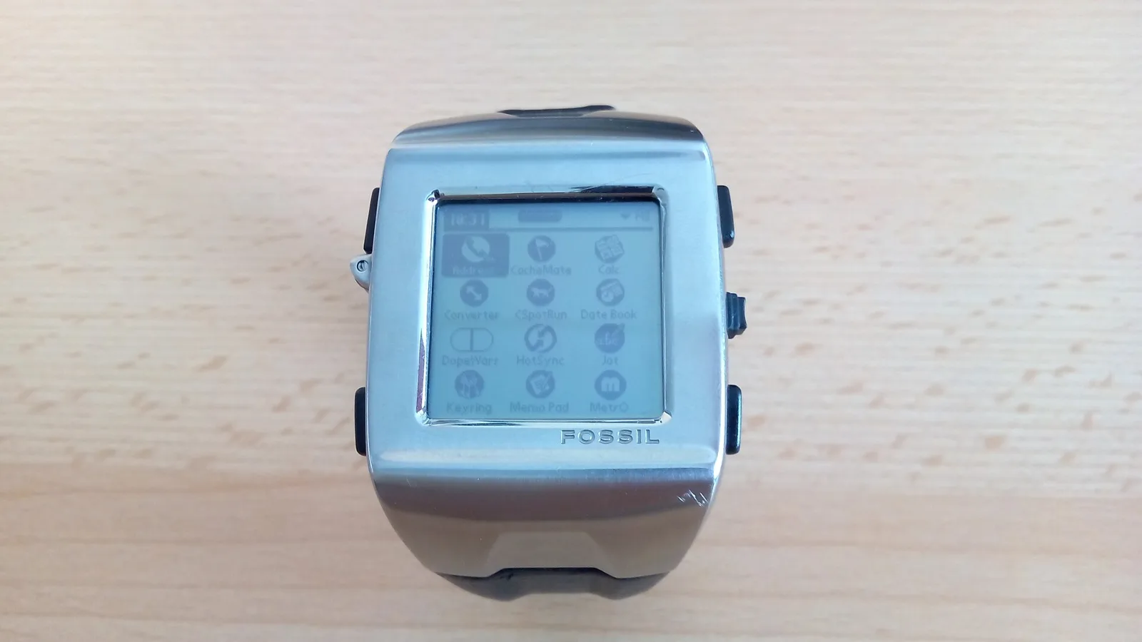 The Fossil Wrist PDA smartwatch - the model 2.0 from about 2004.
The Fossil (also sold as the Abacus) Wrist PDA was actually a full-featured but miniaturised version of older Palm pocket computer. I