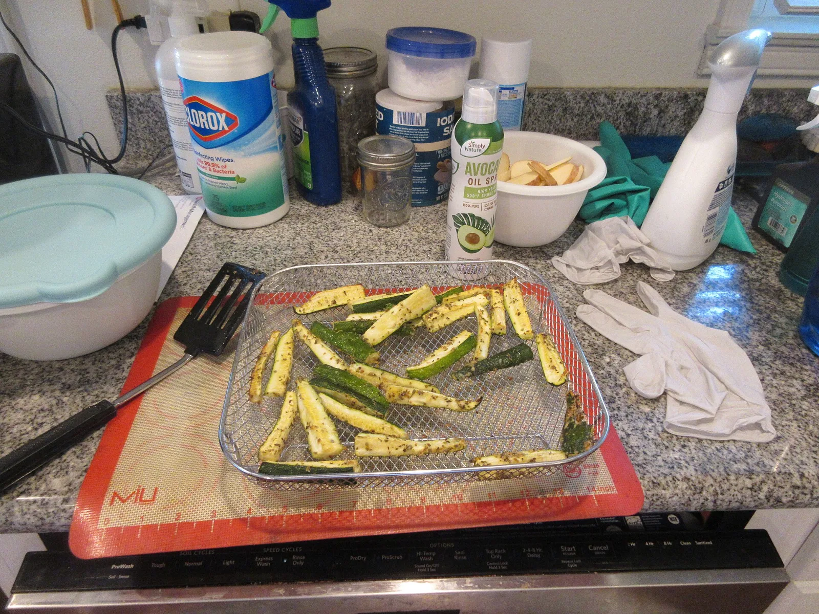 Sliced Zucchini, air fried with herbs. Trying out the air fryer function on our new toaster oven. Yum.